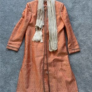Orange Embroidered Long Kurta with Scarf and White Kurta Pants.